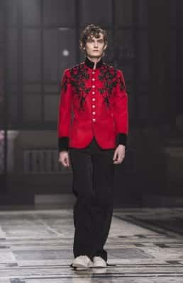 A model on the catwalk during the Alexander McQueen London Collections Men AW2016 show at Durbar Court, The Foreign And Commonwealth Office, London.