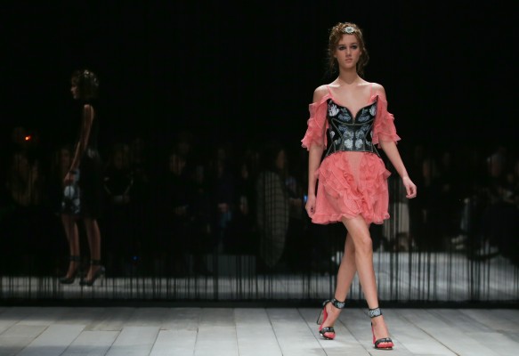 A model on the catwalk during the Alexander McQueen Fall Winter 2016 Women's Show at Lawrence Hall, London.