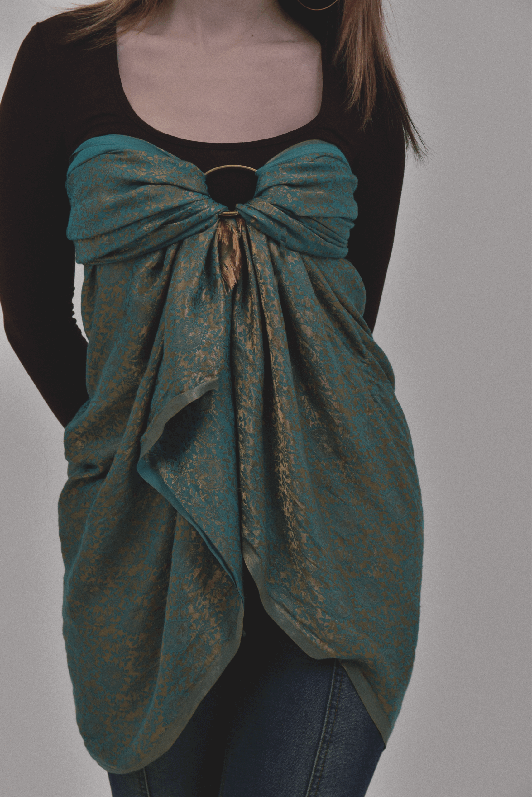Using a bracelet to create a layered bandeau out of a scarf
